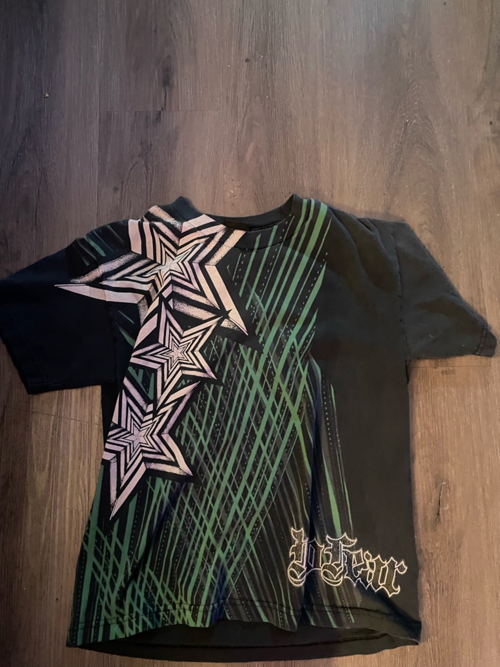 Black Graphic Star-Print Mens Tee with Green Accents